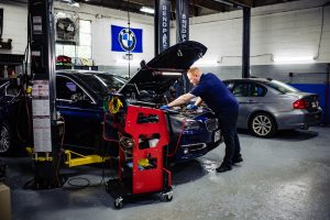 Mechanic Working on a Car